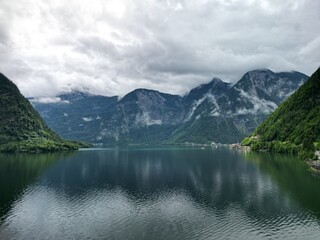 Landscape of Hallstatt lake in Austria with cloudy sky.