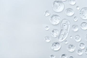 Drops of gel face serum top view. Abstract gel drops for design. Liquid gel moisturizer. - 625036538