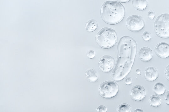 Drops of gel face serum top view. Abstract gel drops for design. Liquid gel moisturizer.
