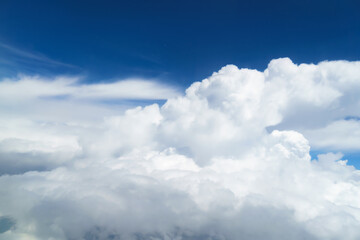 Naklejka na ściany i meble beautiful blue sky with cumulus clouds for abstract background, aerial view