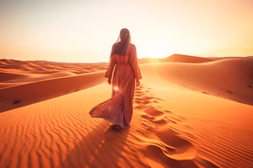 Selbstklebende Fototapete Abu Dhabi Arabian woman in the desert at sunset travel conception ai generated art