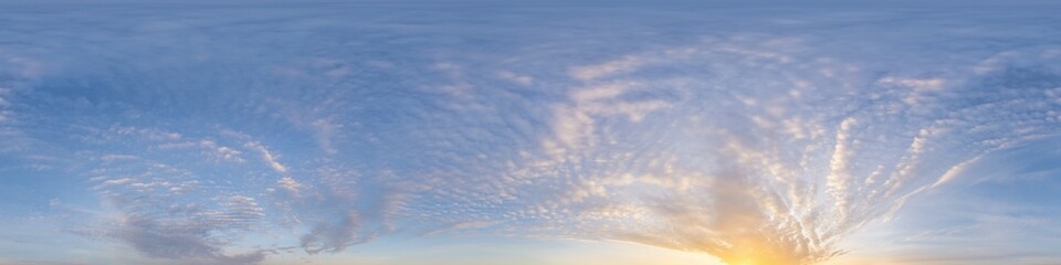 Sunset sky panorama with dramatic bright glowing pink Cirrus clouds. HDR 360 seamless spherical...
