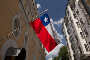 Chilean national flag. Bandera nacional Chilena. Chilean flag hanging on a flagpole. La Estrella Solitaria. Close up. Bottom up view.