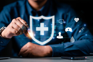 business, shield, insurance, protection, security, safety, assurance, wealth, life assurance, finance. businessman use pen drawing shield hud. the importance of insurance in the digital age.