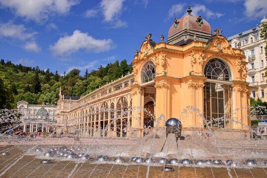 The stunning building of the Maxim Gorki colonnade with fountain in front at spa city Marianske Lazne, Czech republic