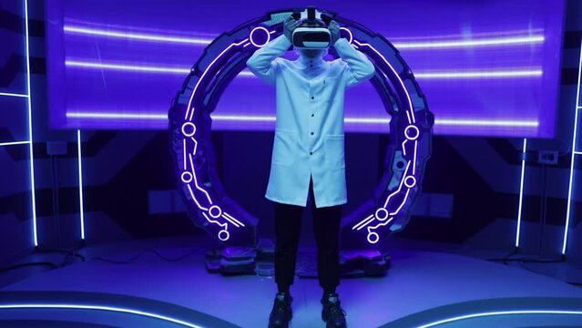 Professional tester using VR headset in modern, futuristic interior. Female scientist developing augmented reality software in spacecraft cabin. High quality 4k footage