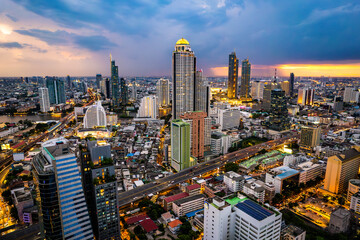 Fototapeta premium Aerial view of Sathorn and Saphan Taksin districts in Bangkok, Thailand