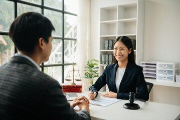 Business and Male lawyer or judge consult having team meeting with client, Law and Legal services concept.Customer service good cooperation in office.