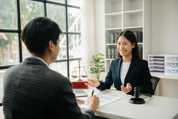 Business and Male lawyer or judge consult having team meeting with client, Law and Legal services concept.Customer service good cooperation in office.