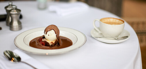 Fototapeta na wymiar Banner Dessert and coffee. Brownie with ice cream and chocolate sauce