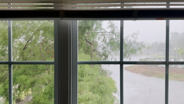 Looking through window during tropical storm