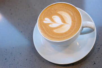 Close up of coffee latte in white mug. Latte art. High quality 4k footage