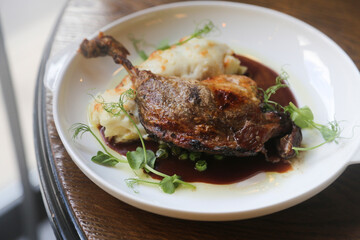 Roasted duck leg with wine sauce