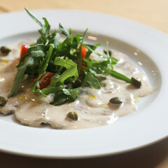 Traditional vitello tonnato with capers