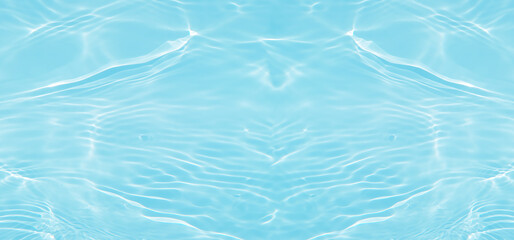 Blue water with ripples on the surface. Defocus blurred transparent blue colored clear calm water surface texture with splashes and bubbles. Water waves with shining pattern texture background.