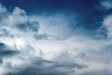 Naklejka na ściany i meble Storm-cloud. Gray big dramatic clouds.