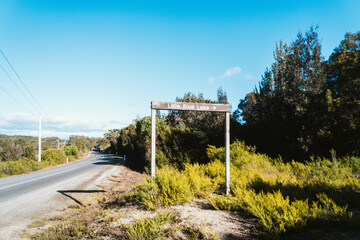 Tasmania's North East showcases the stunning Little Blue Lake sign. 