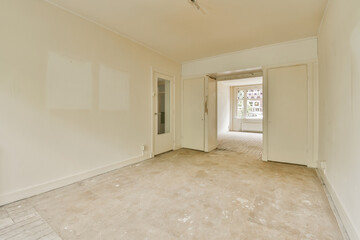 an empty room with white walls and no one person standing in the doorways or door to the other room
