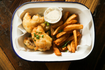 Traditional fish and chips with sauce
