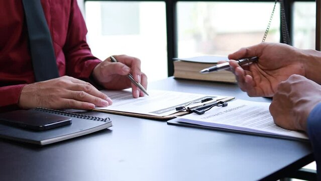 Attorneys or lawyers are advising clients in defamation cases, they are collecting evidence to bring charges against the parties for damages. The concept of defamation case counseling.