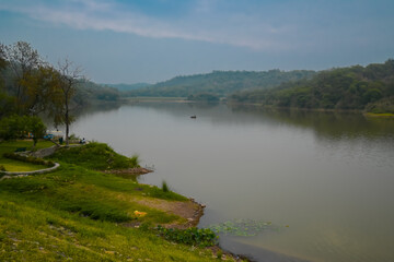 Beautiful landscape of water lake and green forest from Himachal Pardesh a city of hills in India.