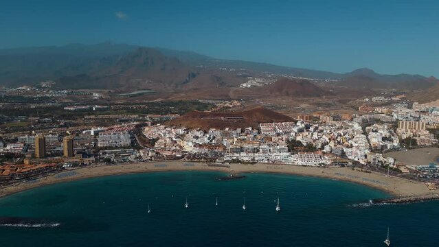 ocean shore with hotels and beach, Los Cristianos, Tenerife, Canary, aerial shot