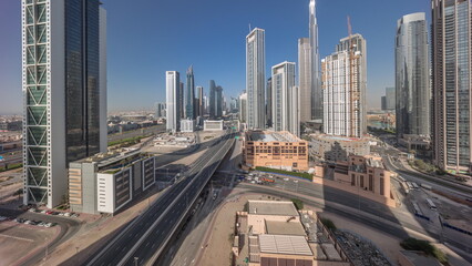 Fototapeta na wymiar Aerial panoramic view of Dubai Downtown skyline with many towers timelapse.