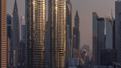 Fototapeta na wymiar Dubai International Financial district aerial timelapse during sunrise