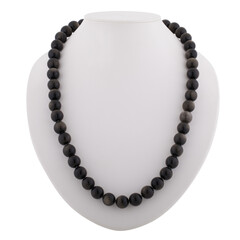 Obraz premium Dark mineral necklace on a white mannequin