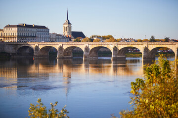 Fototapeta premium Scenic view of the Loire river with Cessart bridge in Saumur, Maine-et-Loire department, France