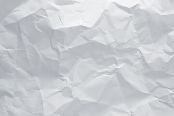 White crumpled paper texture background, clean white wrinkled paper, top view.