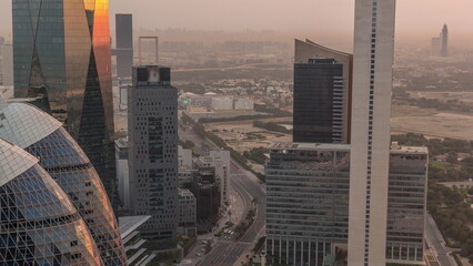 Skyline view of the high-rise buildings on Sheikh Zayed Road in Dubai aerial morning timelapse, UAE.