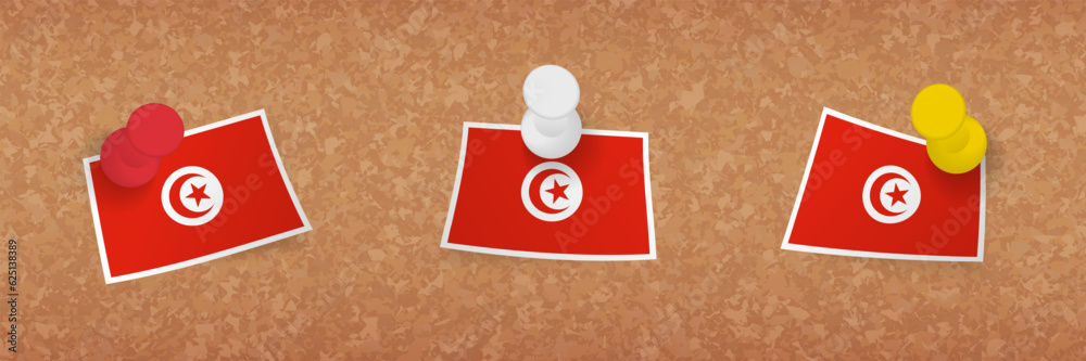 Wall mural tunisia flag pinned in cork board, three versions of tunisia flag.