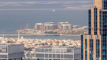 Aerial view of apartment houses and villas in Dubai city near downtown timelapse.