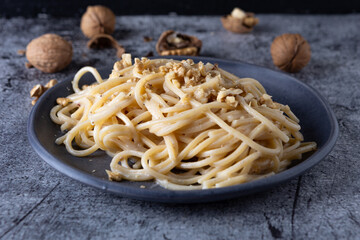 Spaghetti with walnut cream. Simple, nutritious and tasty dish suitable for those who follow a vegetarian diet.