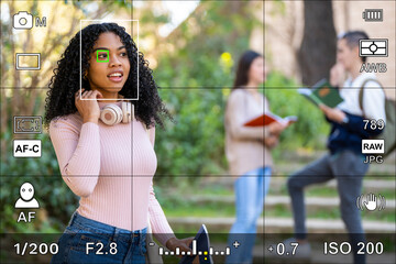 Screen or camera viewfinder with the photographic settings of a portrait photo