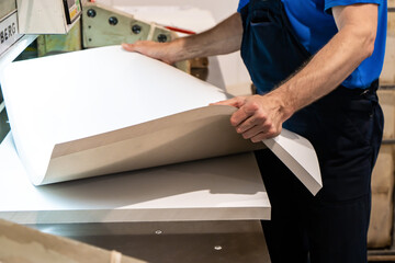 close up engineer hand finger press button controling cnc machine, Workers operating factory machinery in warehouse