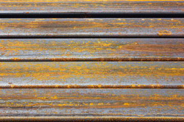 Industrial warehouse of metal profile beams, metal structures.Warehouse of metal rusty beams, metal profile structures.