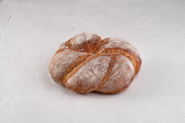 round loaf of bread isolated on white background
