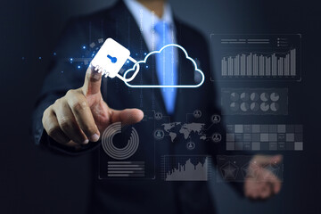 Businessman reach out the hand to touch lock on the cloud computing system to protect online data business  information system. Cyber security concept. © AREE