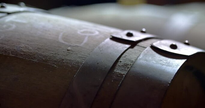 close up of wine barrel in a wine cellar