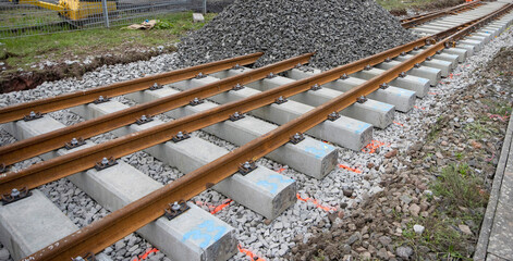 railway construction site with rails attachment and gravel