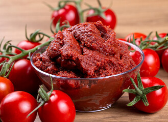 Fresh tomatoes and tomato paste