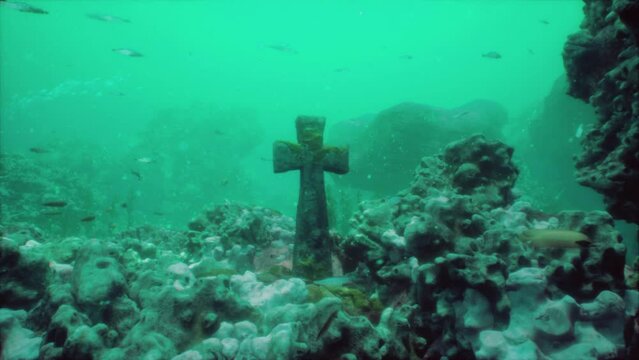 Crosses underwater in sunken cemetery on bottom of volcanic origin in Atlantic
