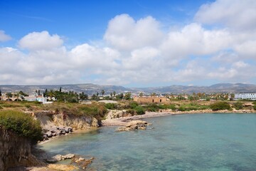 Fototapeta na wymiar Resort town of Coral Bay in Cyprus. Coast view in May. Paphos region.