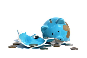 A broken piggy bank with money lies on a white background.	