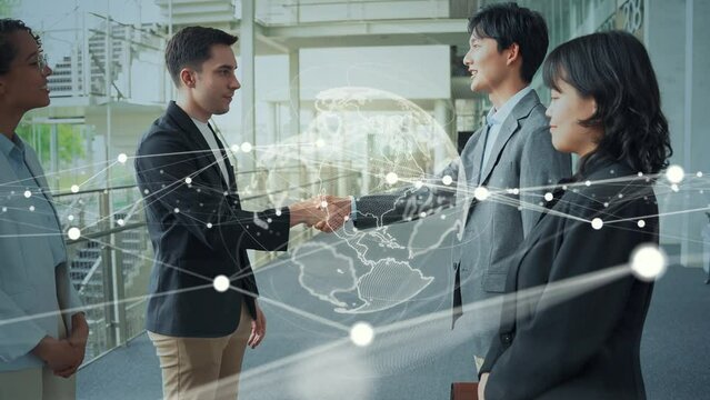 ロビーで握手する多国籍の人々とグローバルネットワーク