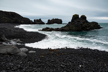 Bizarre black basalt rock formation called Bárðarskip (