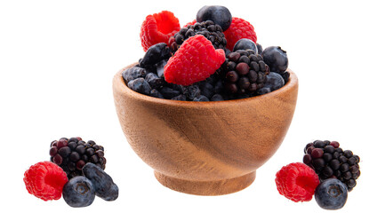 Wild berries in a wooden bowl isolated on transparent background png. Fresh ripe raspberries, blueberries, blackberries and honeysuckle