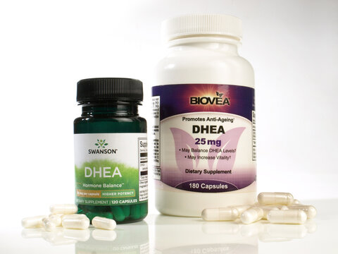 DHEA with Pills isolated on white Background